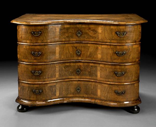 Appraisal: A Continental Rococo crossbanded walnut chest second half th century