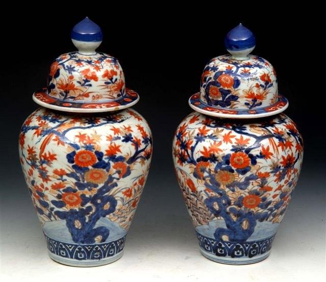 Appraisal: A PAIR OF JAPANESE IMARI PORCELAIN VASES AND COVERS each