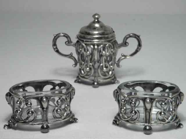 Appraisal: A continental silver and glass three piece condiment set Includes