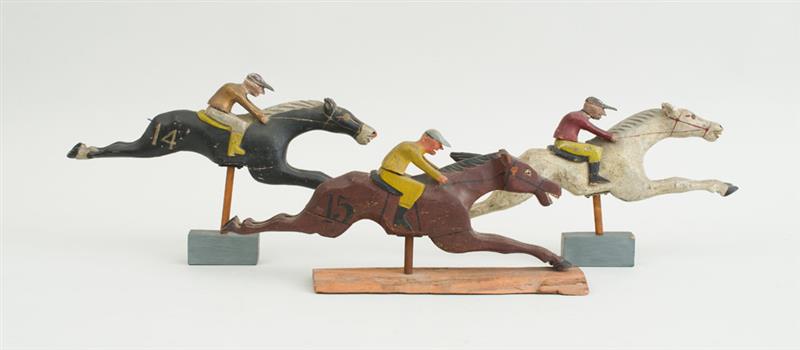 Appraisal: THREE CARVED AND PAINTED WOOD HORSE RACERS Variously numbered and