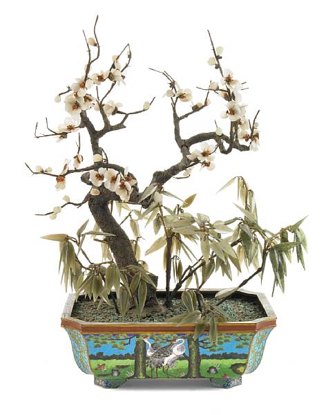 Appraisal: A Chinese cloisonne jardiniere with polished hardstone shrub height in