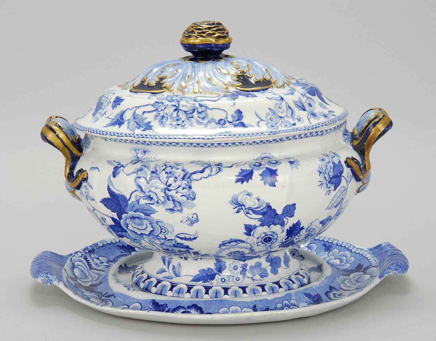 Appraisal: STAFFORDSHIRE SOFT-PASTE COVERED SOUP TUREEN WITH UNDERTRAY th CenturyBy Riley's