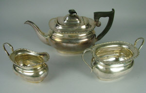 Appraisal: A George III style silver three piece tea set Sheffield