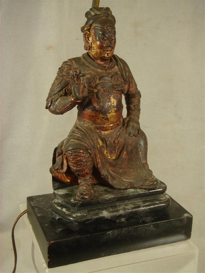 Appraisal: Carved wood Oriental seated figure converted to a lamp losses