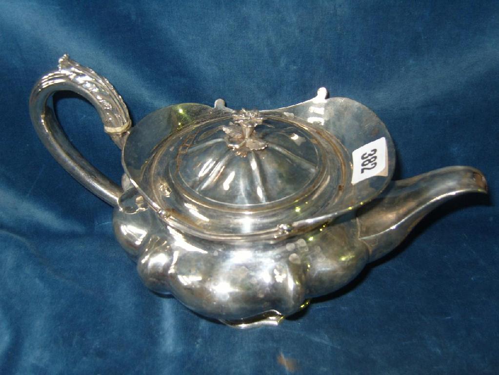 Appraisal: A heavy th century silver teapot of baluster form with