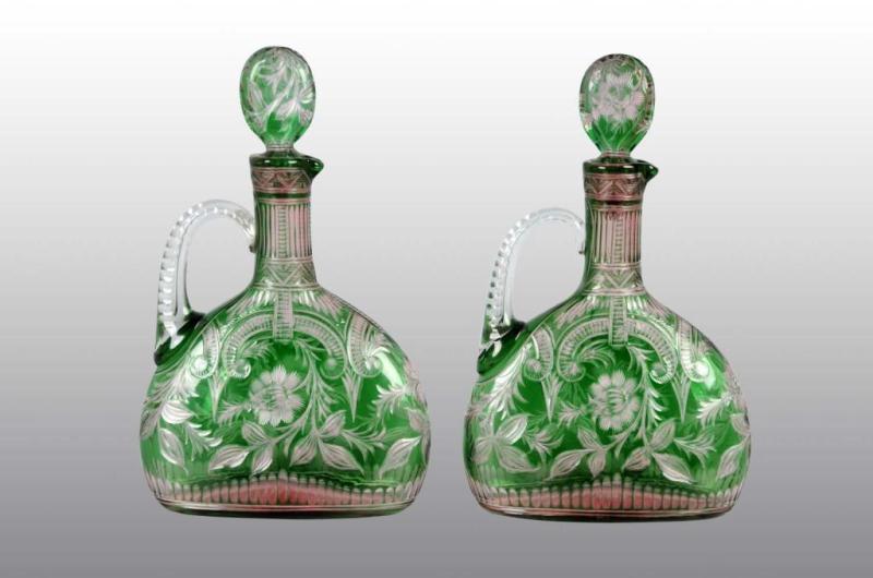 Appraisal: Pair of Hand Cut Crystal Decanters Description Green glass Original