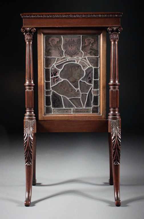 Appraisal: Potthast Brothers Classical style carved mahogany fire screen with leaded