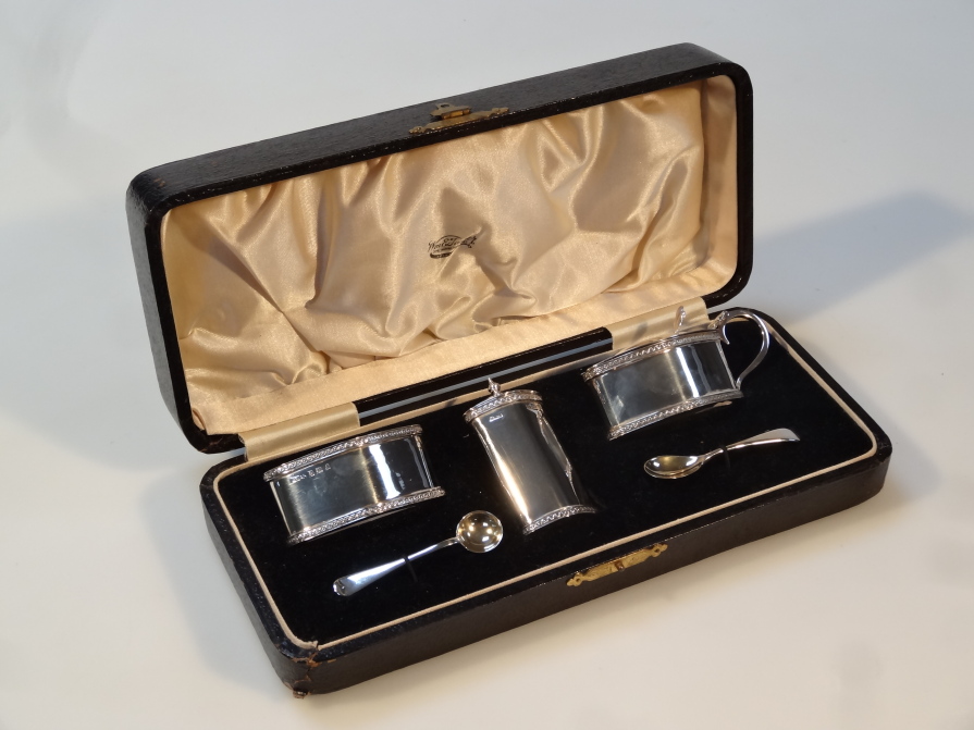 Appraisal: A George V silver cruet set by Henry Williamson Ltd