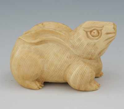 Appraisal: A Carved Ivory Rabbit Netsuke The large netsuke of a