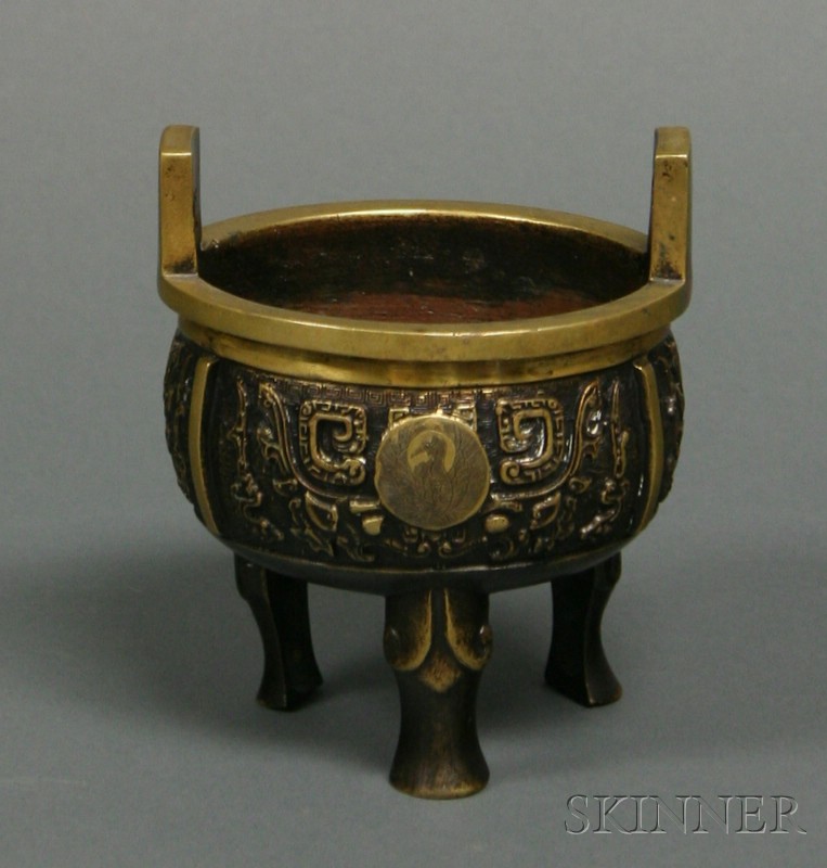 Appraisal: Bronze Censer Japan late th century archaic ritual bronze form