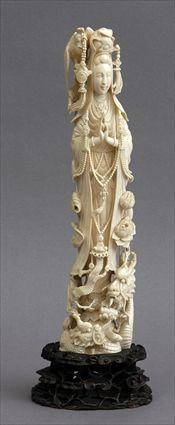 Appraisal: CHINESE CARVED IVORY FIGURE OF KWAN YIN PRAYING In elaborate