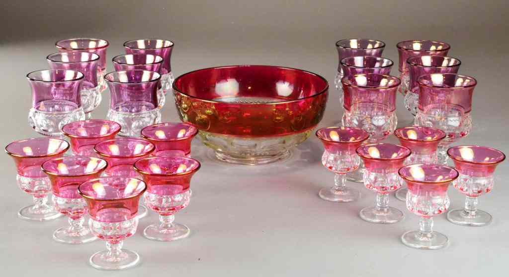 Appraisal: Ruby Lustre Pressed Glassware BowlsTo include twelve footed punch glasses