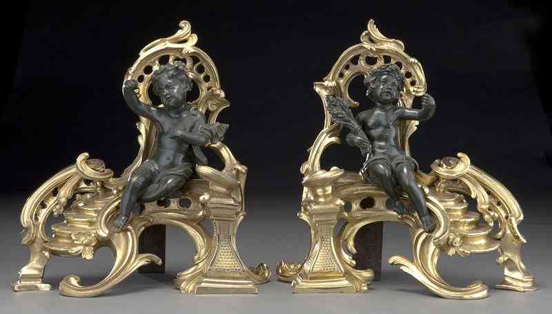 Appraisal: Pr Louis XV style parcel gilt and patinatedbronze chenets modeled