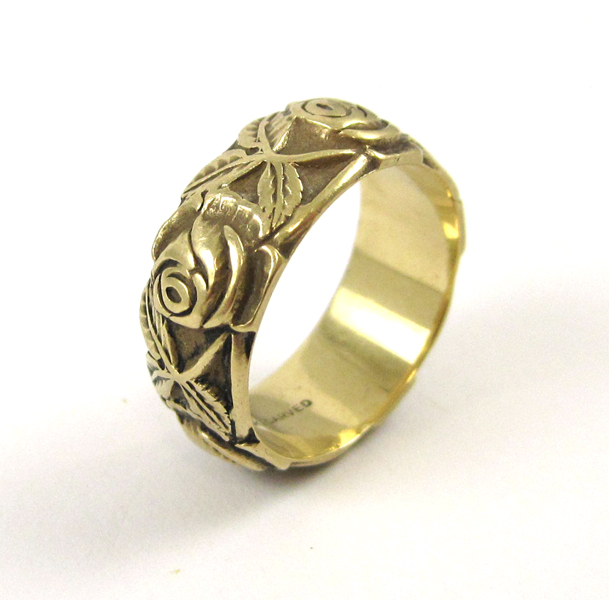 Appraisal: FOURTEEN KARAT GOLD ART CARVED BAND weighing grams and measuring