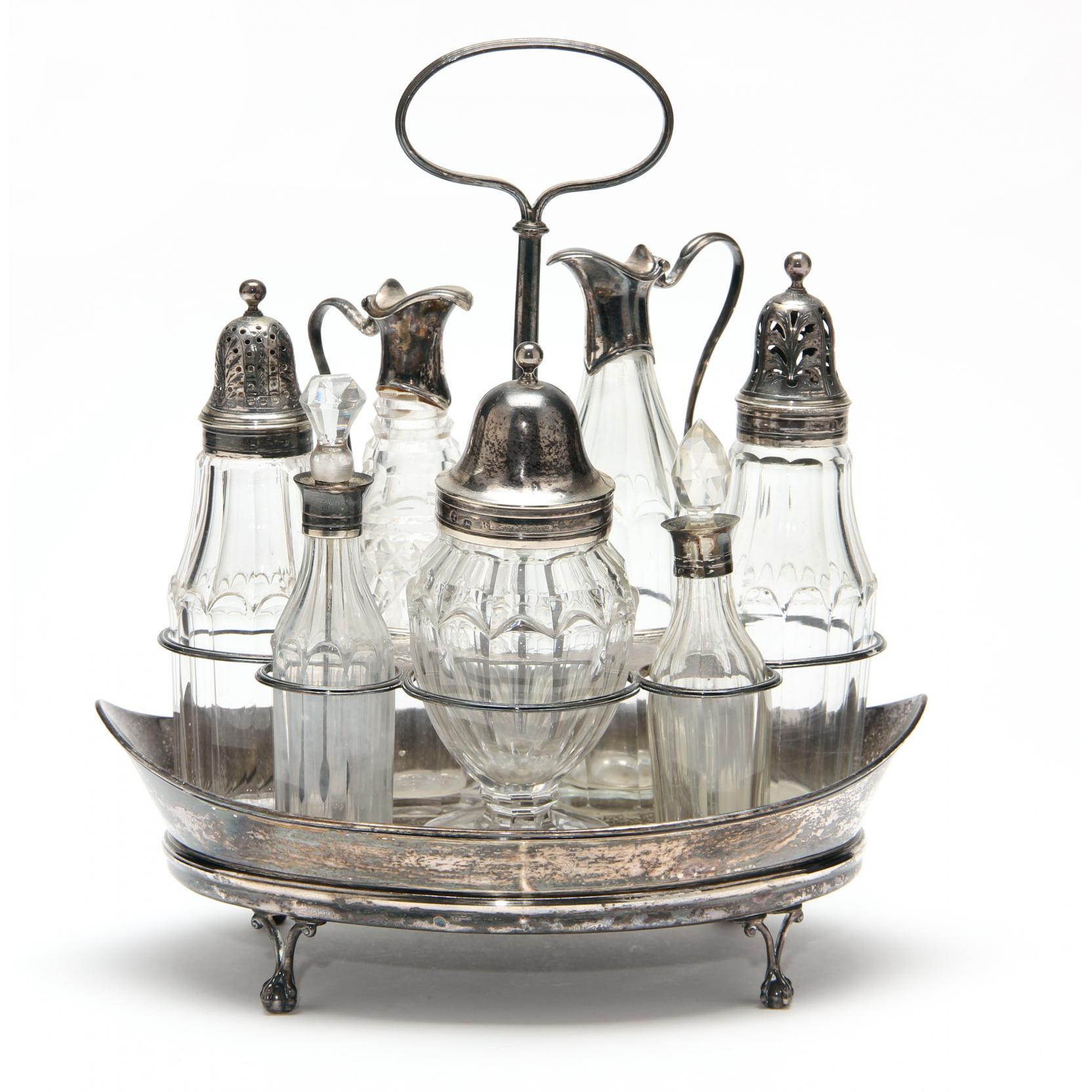 Appraisal: George III Silver Glass Cruet Set with London hallmarks RH