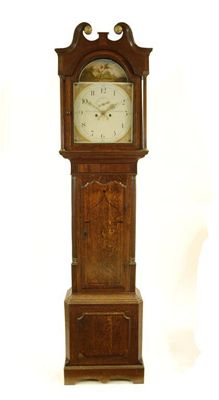 Appraisal: An day oak longcase clock striking on a bell with