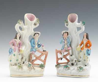 Appraisal: A Pair of Spill Vases Each depicting a young couple