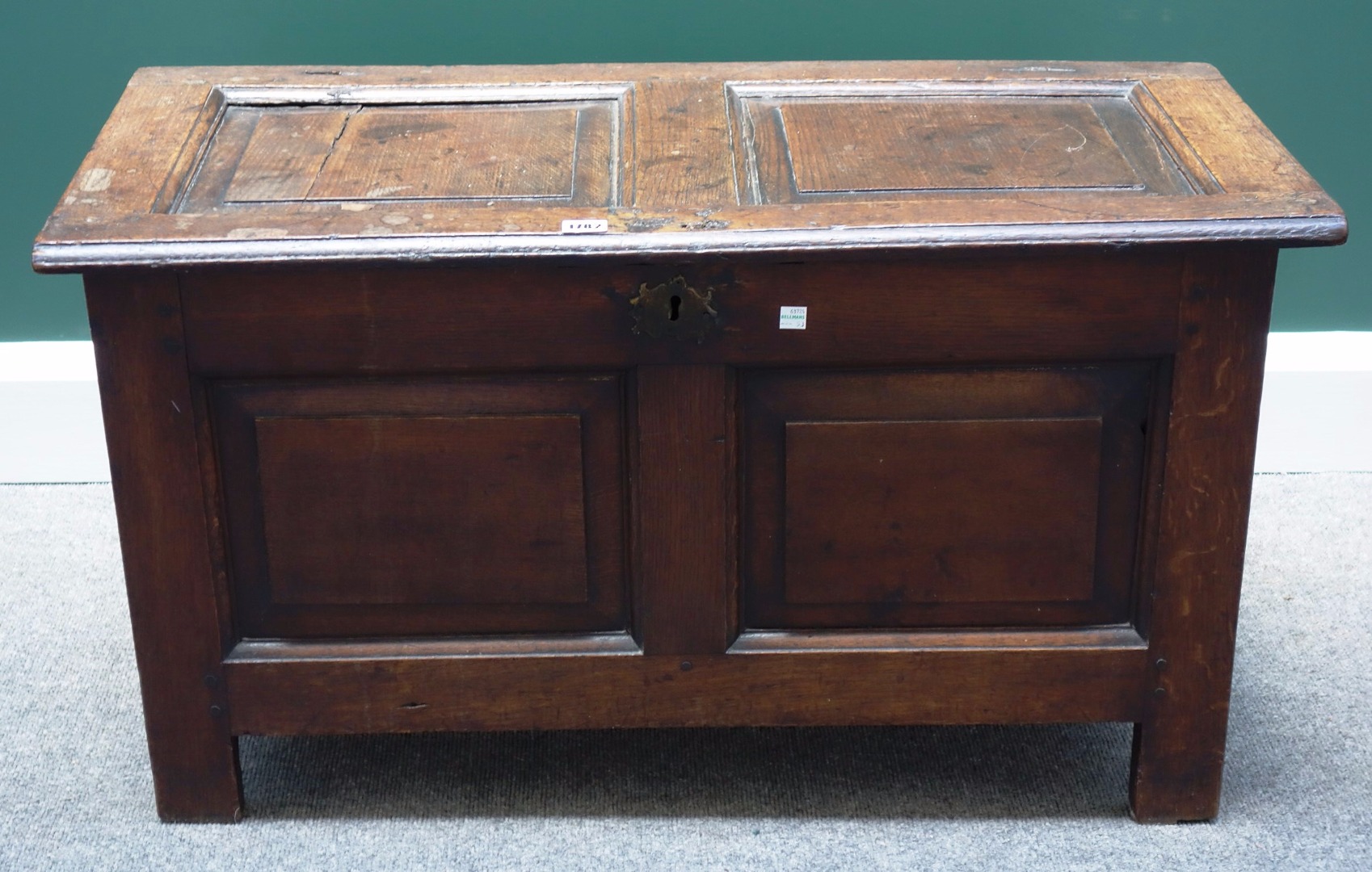 Appraisal: A small th century oak coffer with double panel lid