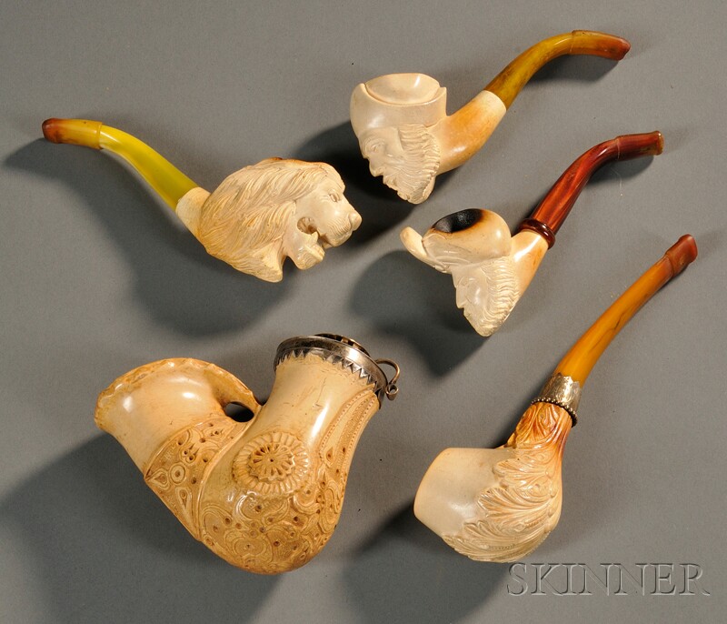 Appraisal: Five Carved Pipes two carved Meerschaum pipes carved as bearded