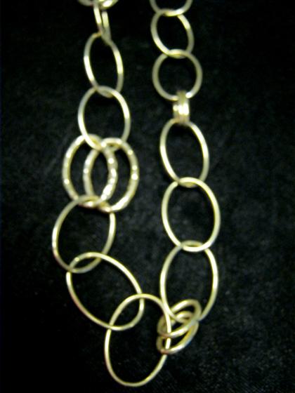 Appraisal: karat gold necklaceSingle and double hoop links