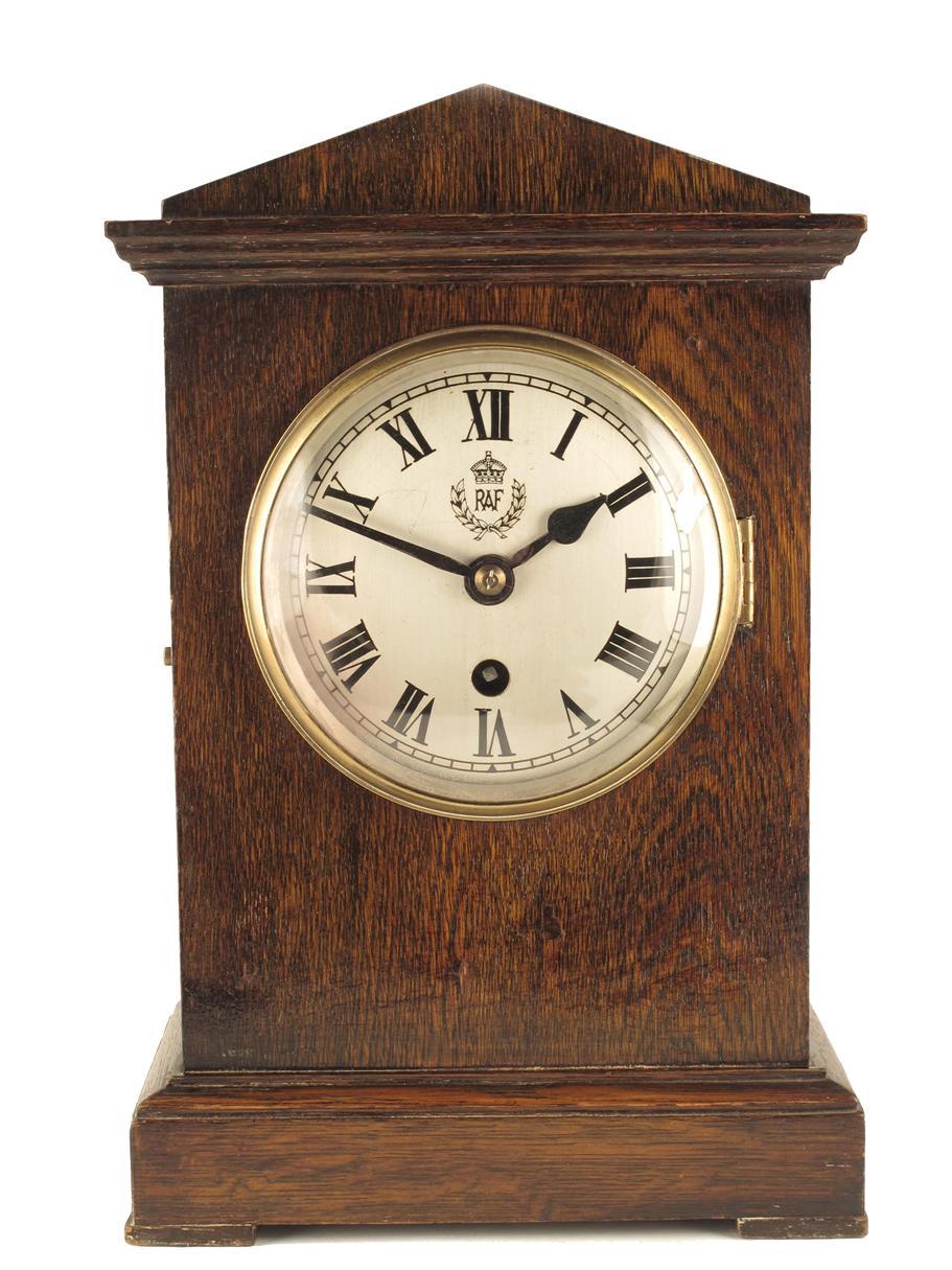 Appraisal: An oak cased RAF mantle timepiece