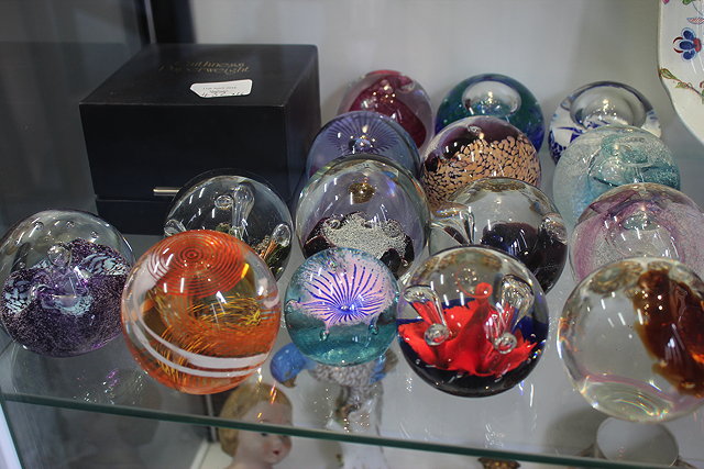 Appraisal: CAITHNESS GLASS PAPERWEIGHTS to include 'Cosmic Fountain' 'Asteroid' 'Breakers' 'Caldonia'