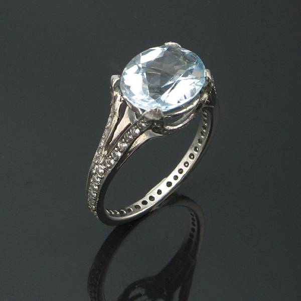 Appraisal: An aquamarine diamond and white gold ring two diamonds missing