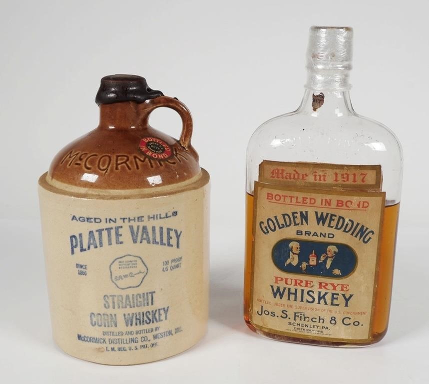 Appraisal: Two American whiskey containers from the early s a Platte