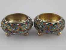 Appraisal: A pair of Russian cloisonne enamelled silver salts by Ivan