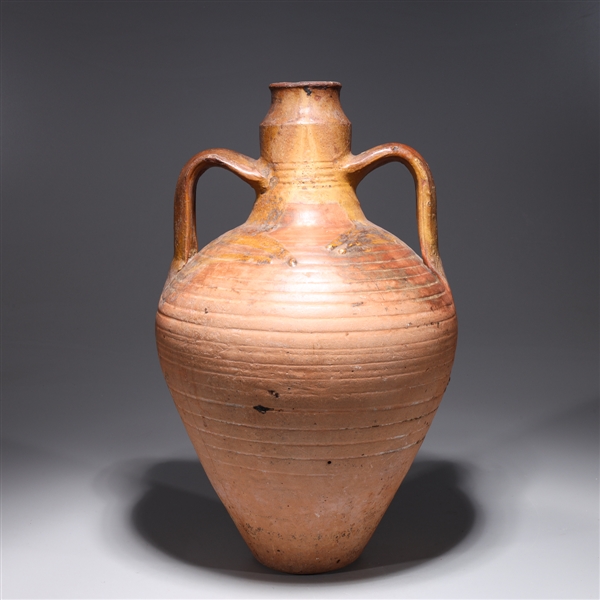 Appraisal: Chinese early style ceramic jug with molded handles and incised