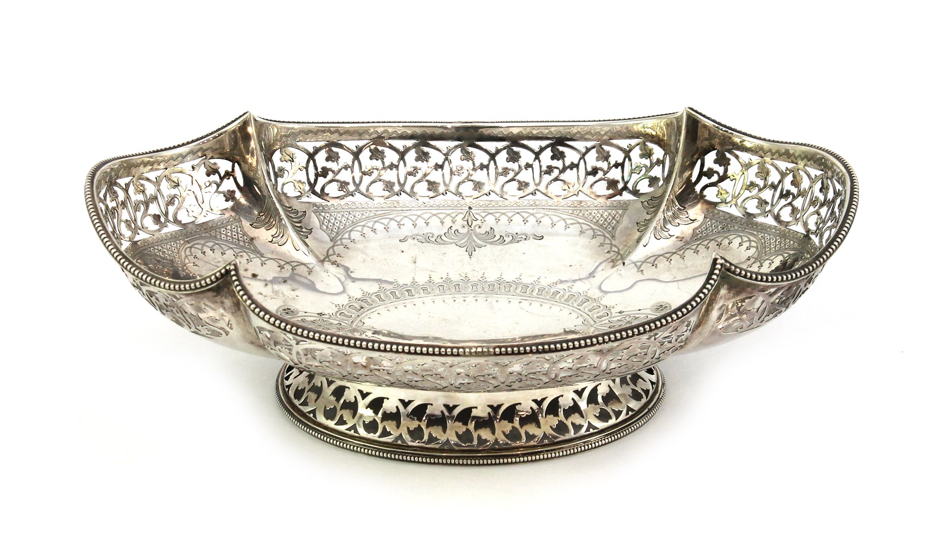 Appraisal: A Victorian silver shaped oval footed basket decorated with a