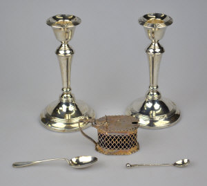 Appraisal: A pair of loaded silver candlesticks Chester cm to w