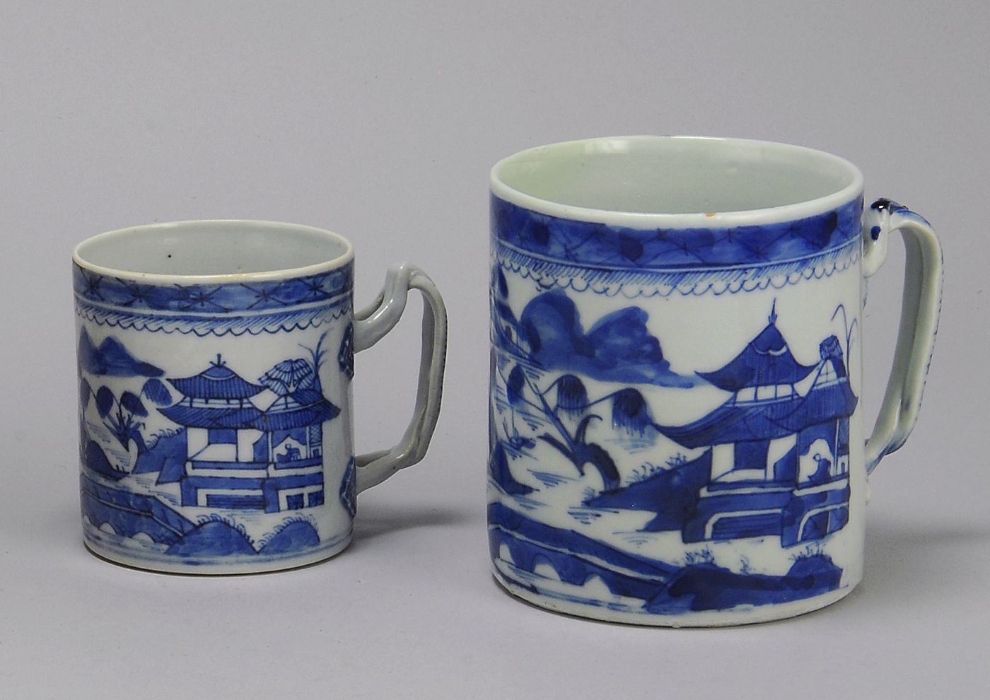 Appraisal: TWO CHINESE EXPORT CANTON PORCELAIN MUGS OR TANKARDS Mid- th