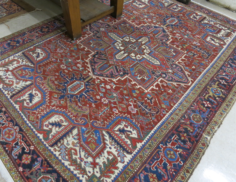 Appraisal: AN ANTIQUE PERSIAN HERIZ CARPET East Azerbaijan northwestern Iran early