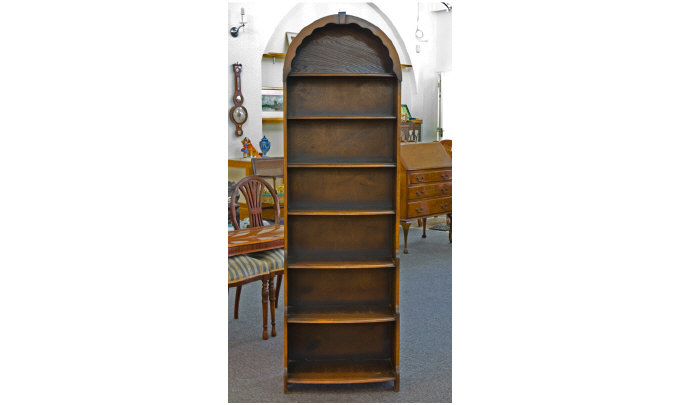 Appraisal: Free Standing Oak Bookcase Consists of shelves with a dome