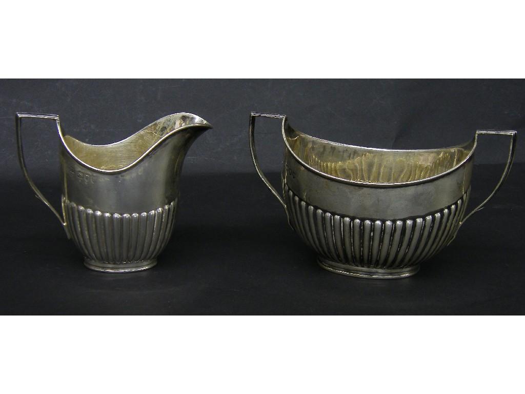 Appraisal: George V silver half fluted milk jug and twin handled