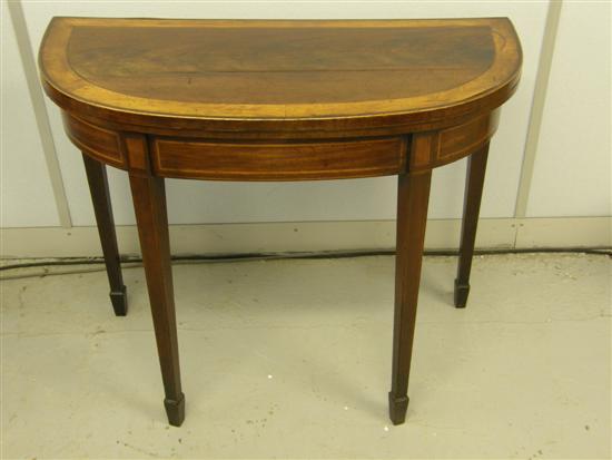 Appraisal: th Century mahogany and satinwood crossbanded folding card table on