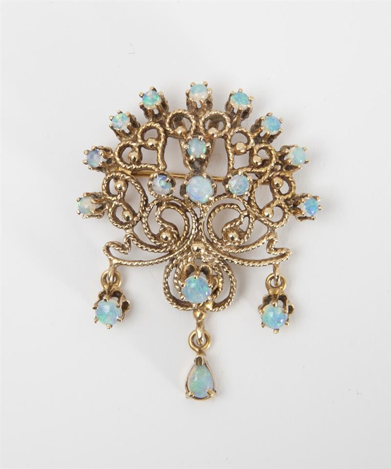 Appraisal: K GOLD AND OPAL PENDANT PIN With pale opals x