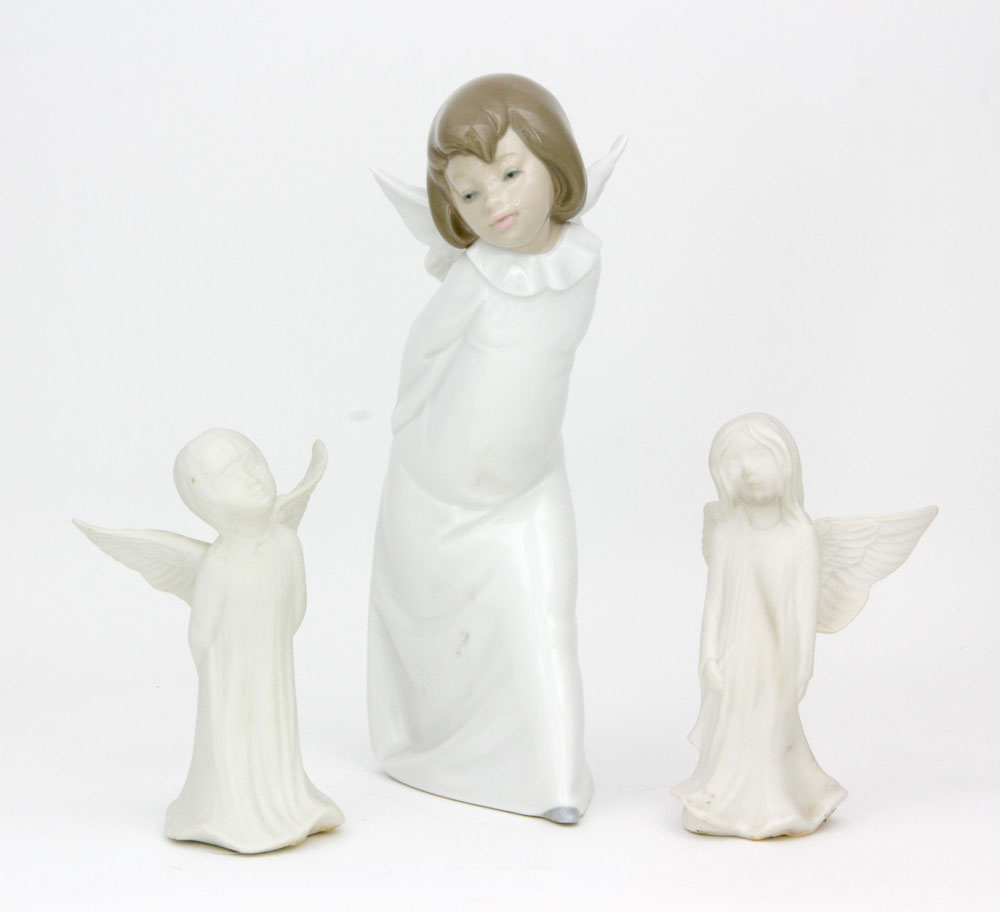 Appraisal: - Angel Figurines Lot of three angel figurines including two