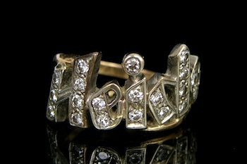 Appraisal: A Gold and Diamond Heide Name Ring k yellow gold