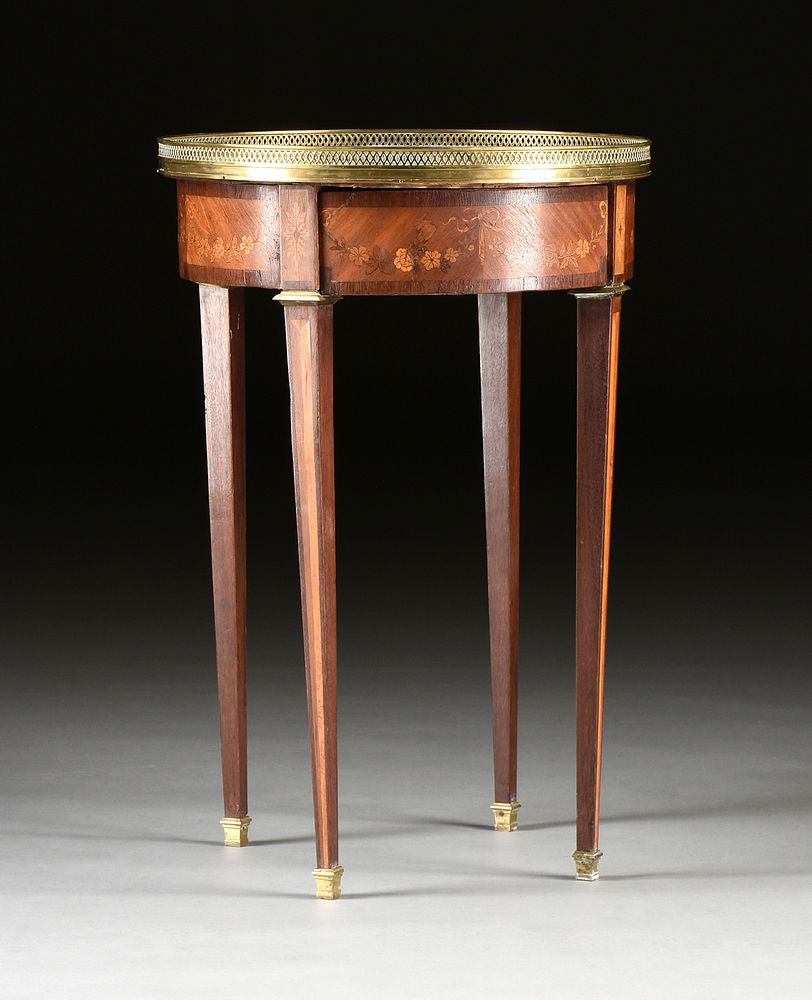 Appraisal: A LOUIS XVI STYLE MARBLE TOPPED AND MARQUETRY INLAID TULIPWOOD