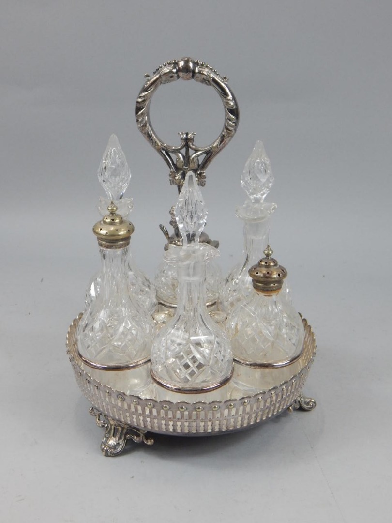 Appraisal: A late th early thC silver plated cruet containing a