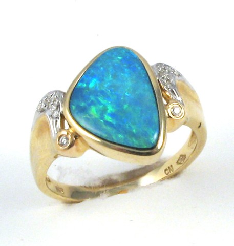 Appraisal: OPAL DIAMOND AND YELLOW GOLD RING k gold and set