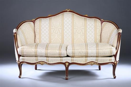 Appraisal: LOUIS XV STYLE PARCEL-GILT CANAPE late th century loveseat size