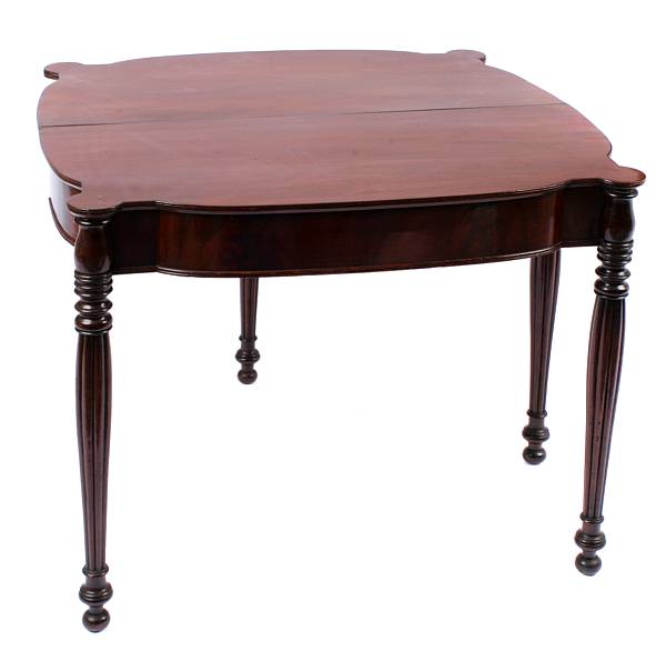 Appraisal: An American classical mahogany games table height in width in