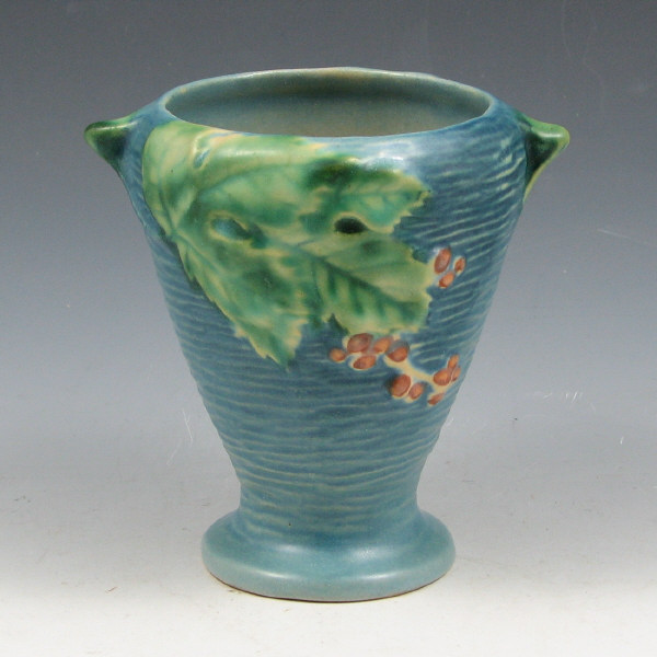 Appraisal: Roseville Bushberry vase in blue Marked Roseville USA - Mint