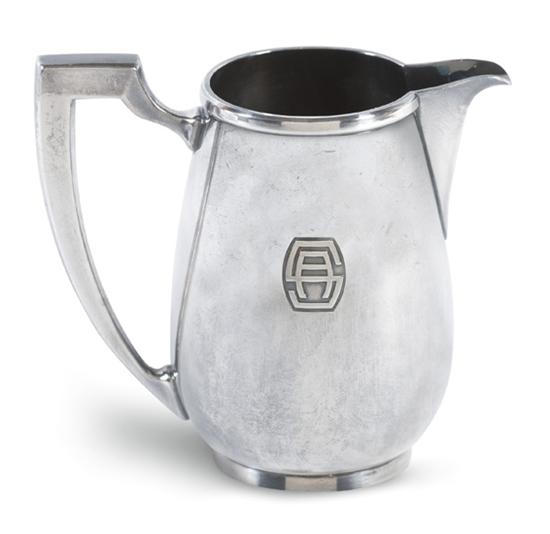 Appraisal: COMPAGNIE de NAVIGATION SUD-ATLANTIQUE Silver creamer with bulbous bottom by