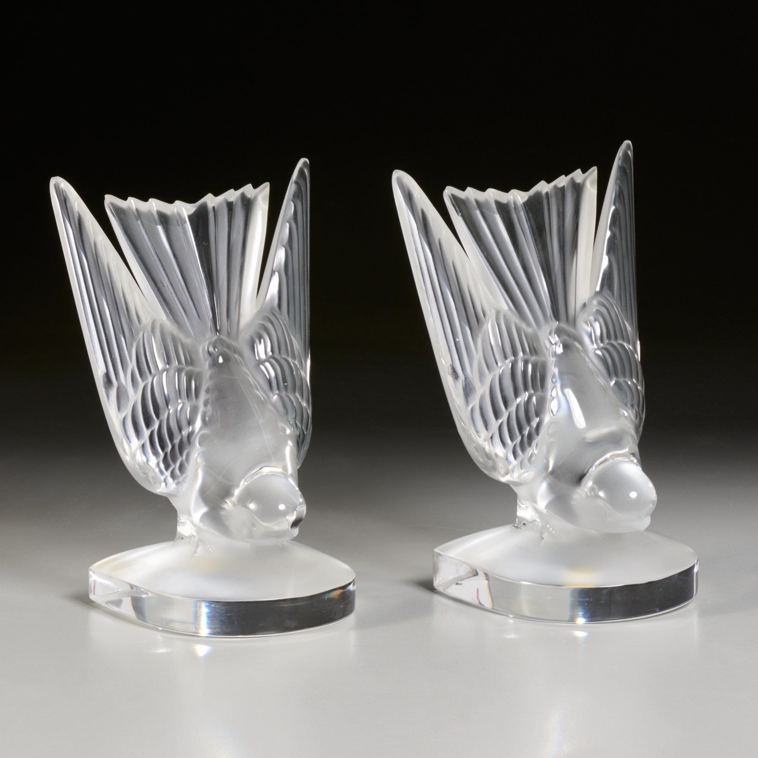 Appraisal: LALIQUE PAIR HIRONDELLE BOOKENDS th c France diamond etch signed