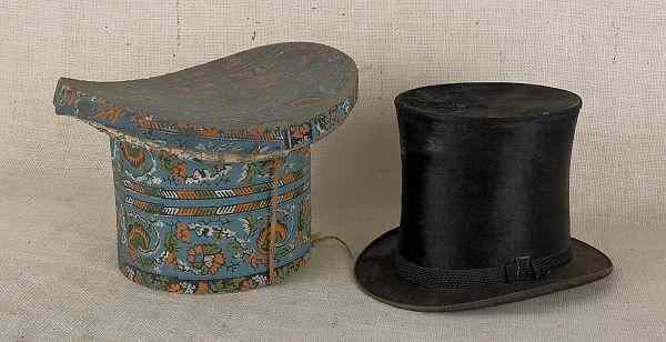 Appraisal: Wallpaper hat box th c with orange floral decoration on