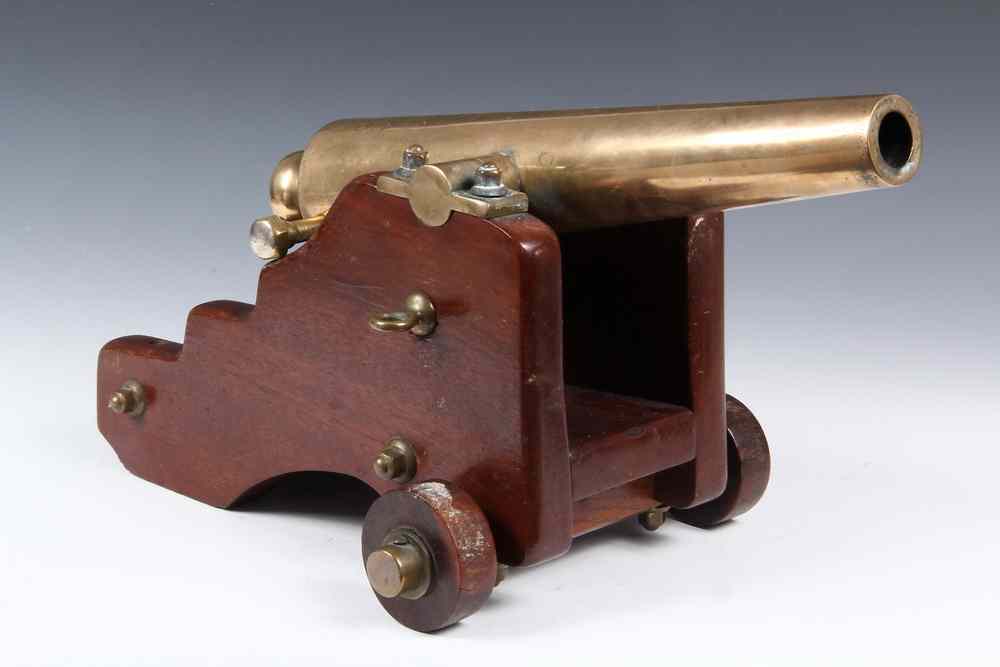 Appraisal: SMALL YACHT CANNON - Small Bronze Cannon on Mahogany Carriage